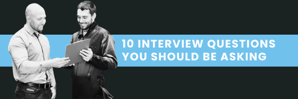 Automotive shop manager interviewing a technician candidate in a modern repair facility